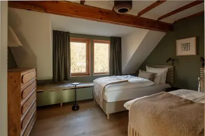 Ein Bett oder Betten in einem Zimmer der Unterkunft Design farmhouse in the countryside