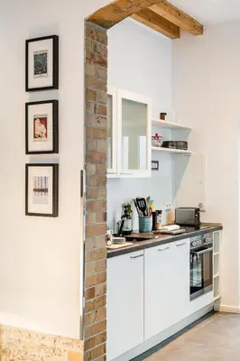 Küche/Küchenzeile in der Unterkunft BerlinCityHouse - Unique Tiny Garden Townhouse