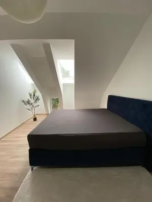 Ein Bett oder Betten in einem Zimmer der Unterkunft Hengstresort Velten