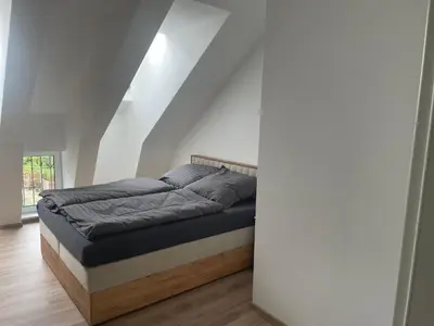 Ein Bett oder Betten in einem Zimmer der Unterkunft Hengstresort Velten