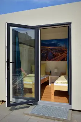 Ein Bett oder Betten in einem Zimmer der Unterkunft CLUB Lodges Berlin Mitte
