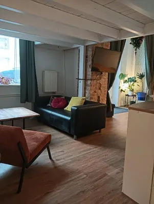 Ein Sitzbereich in der Unterkunft Studio Apartments Alfred