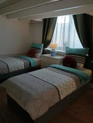 Ein Bett oder Betten in einem Zimmer der Unterkunft Studio Apartments Alfred