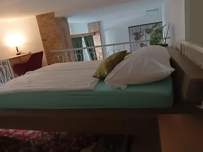 Ein Bett oder Betten in einem Zimmer der Unterkunft Studio Apartments Alfred