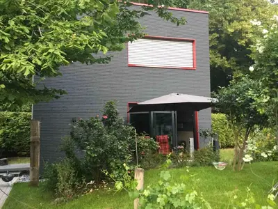 Ein Garten an der Unterkunft Tinyhaus