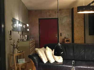 Ein Sitzbereich in der Unterkunft Tinyhaus