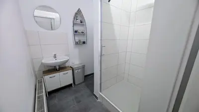 Ein Badezimmer in der Unterkunft Rhin Quartier Ferienwohnung Hostel-Style