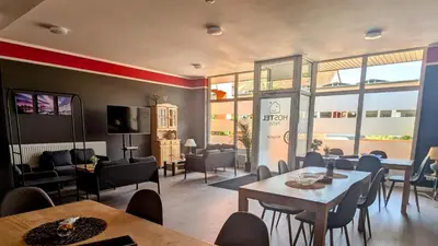 Ein Sitzbereich in der Unterkunft Rhin Quartier Ferienwohnung Hostel-Style