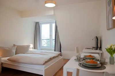 Ein Bett oder Betten in einem Zimmer der Unterkunft Studio Apartment Berlin Mitte 26m2 - U-Bahn Leopoldplatz by Rooms Berlin