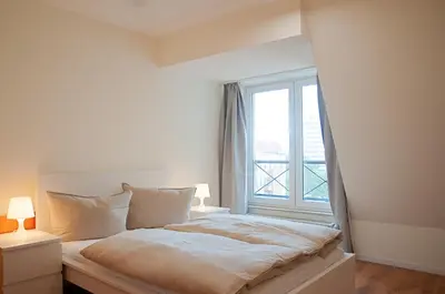Ein Bett oder Betten in einem Zimmer der Unterkunft Studio Apartment Berlin Mitte 26m2 - U-Bahn Leopoldplatz by Rooms Berlin
