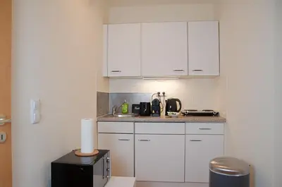 Küche/Küchenzeile in der Unterkunft Studio Apartment Berlin Mitte 26m2 - U-Bahn Leopoldplatz by Rooms Berlin