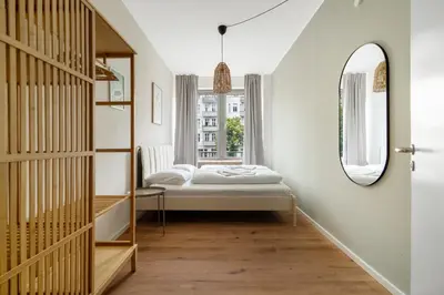 Ein Bett oder Betten in einem Zimmer der Unterkunft Bright & Spacious Berlin Home