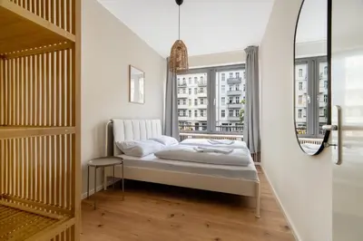 Ein Bett oder Betten in einem Zimmer der Unterkunft Bright & Spacious Berlin Home