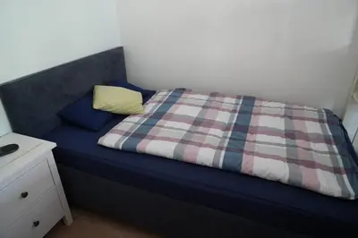 Ein Bett oder Betten in einem Zimmer der Unterkunft Idyllisches Apartment am Wasser - ruhig und zentral