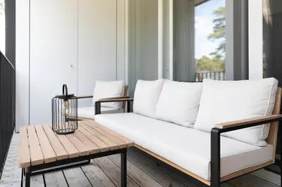 Ein Sitzbereich in der Unterkunft Stay Cozy - Apartment am See mit Pool und Sauna