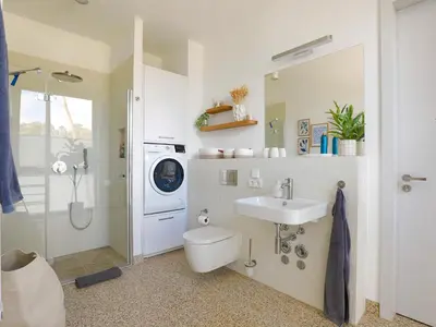 Ein Badezimmer in der Unterkunft Stay Cozy - Apartment am See mit Pool und Sauna