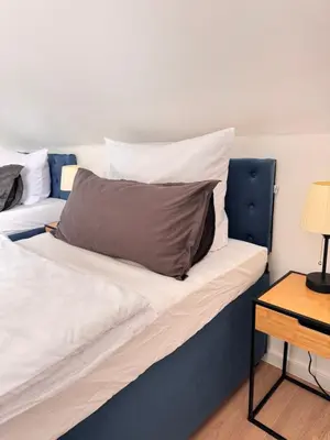 Ein Bett oder Betten in einem Zimmer der Unterkunft Ferienwohnung Express