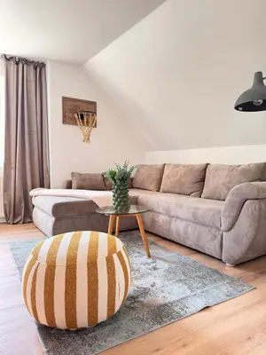 Ein Sitzbereich in der Unterkunft Ferienwohnung Express