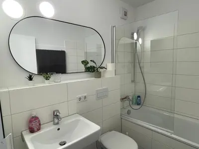 Ein Badezimmer in der Unterkunft Skyline City Apartment