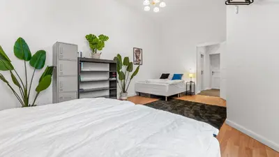 Ein Bett oder Betten in einem Zimmer der Unterkunft Apartment im Samariterviertel - 120QM