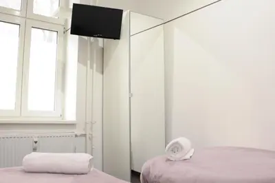Ein Bett oder Betten in einem Zimmer der Unterkunft Modernes Unterkunft - Friedrichshain