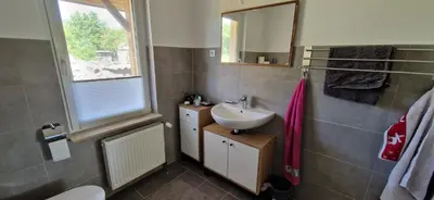 Ein Badezimmer in der Unterkunft Bungalow Helga