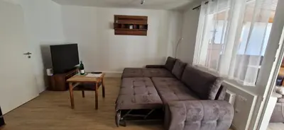 Ein Sitzbereich in der Unterkunft Bungalow Helga