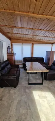 Ein Sitzbereich in der Unterkunft Bungalow Helga