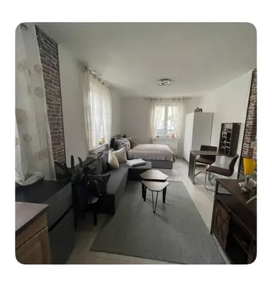 Ein Sitzbereich in der Unterkunft Kleine gemütliche Wohnung
