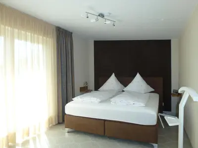 Ein Bett oder Betten in einem Zimmer der Unterkunft Ferienoase an der Wublitz