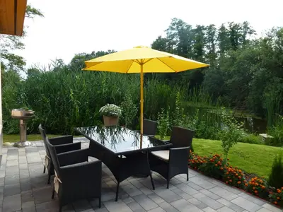Ein Garten an der Unterkunft Ferienoase an der Wublitz