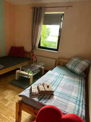 Ein Bett oder Betten in einem Zimmer der Unterkunft Finca Sommerfeld 2-Zimmerhaus mit Terrasse und Garten