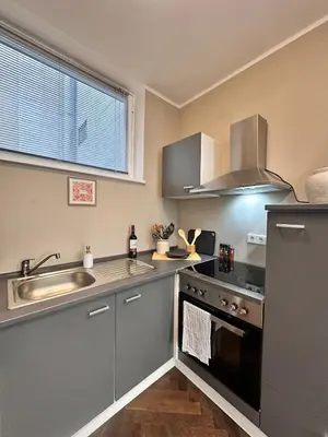 Küche/Küchenzeile in der Unterkunft Gemütliches Apartment - Modern nähe Ku'damm