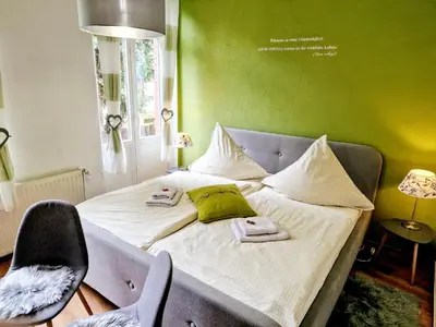Ein Bett oder Betten in einem Zimmer der Unterkunft Pension im Gesundbrunnental Bad Freienwalde
