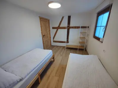Ein Bett oder Betten in einem Zimmer der Unterkunft Ferienwohnung Wustermark