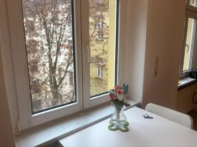 Ein Bett oder Betten in einem Zimmer der Unterkunft Charming Flat in Creative East Berlin