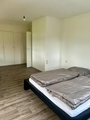 Ein Bett oder Betten in einem Zimmer der Unterkunft Seensucht Das Haus am Steg