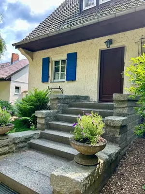 Ein Garten an der Unterkunft Seensucht Das Haus am Steg