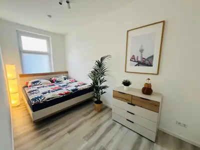 Ein Bett oder Betten in einem Zimmer der Unterkunft Gutshof von Gemünden Ferienwohnung 4