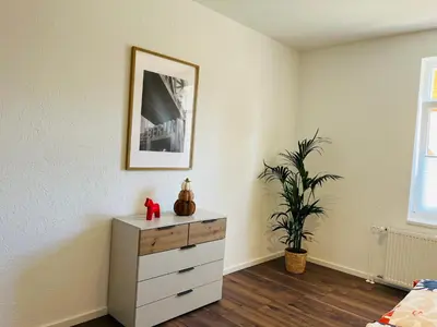 Ein Bett oder Betten in einem Zimmer der Unterkunft Gutshof von Gemünden Ferienwohnung 4