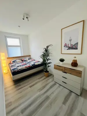 Ein Bett oder Betten in einem Zimmer der Unterkunft Gutshof von Gemünden Ferienwohnung 4