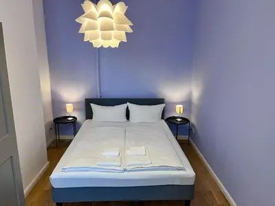 Ein Bett oder Betten in einem Zimmer der Unterkunft Beautiful Apartment in Brüsseler Kiez