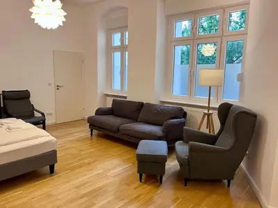 Ein Sitzbereich in der Unterkunft Beautiful Apartment in Brüsseler Kiez