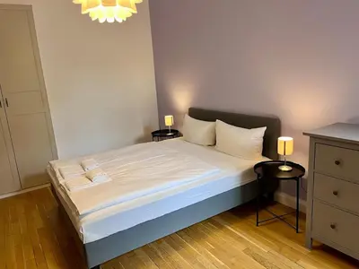 Ein Bett oder Betten in einem Zimmer der Unterkunft Beautiful Apartment in Brüsseler Kiez