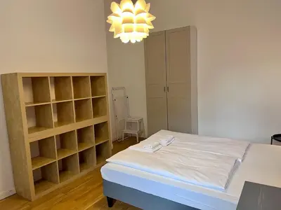 Ein Bett oder Betten in einem Zimmer der Unterkunft Beautiful Apartment in Brüsseler Kiez