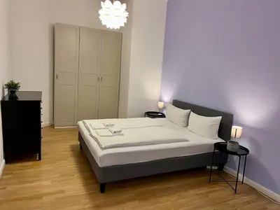 Ein Bett oder Betten in einem Zimmer der Unterkunft Beautiful Apartment in Brüsseler Kiez