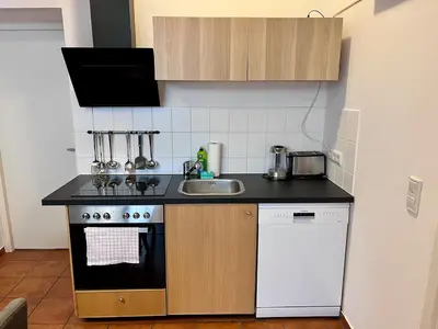 Küche/Küchenzeile in der Unterkunft Beautiful Apartment in Brüsseler Kiez