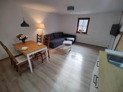 Ein Sitzbereich in der Unterkunft Wustermark Ferienwohnung Unterkunft Dorfanger 8