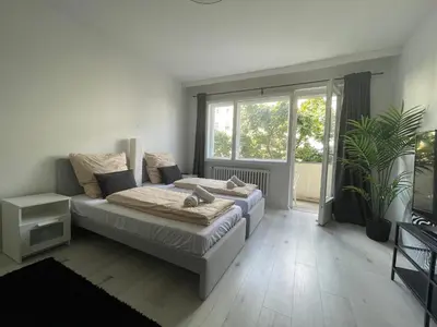 Ein Bett oder Betten in einem Zimmer der Unterkunft Berlin City Stay