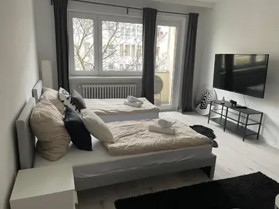 Ein Bett oder Betten in einem Zimmer der Unterkunft Berlin City Stay